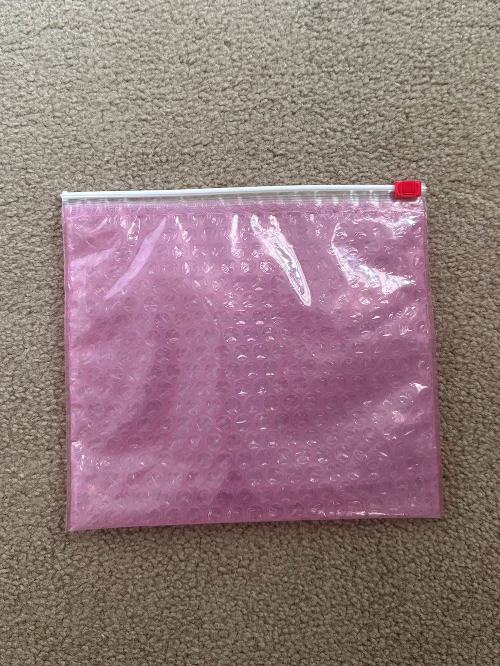 Medium Glossier pink bubble wrap pouch
